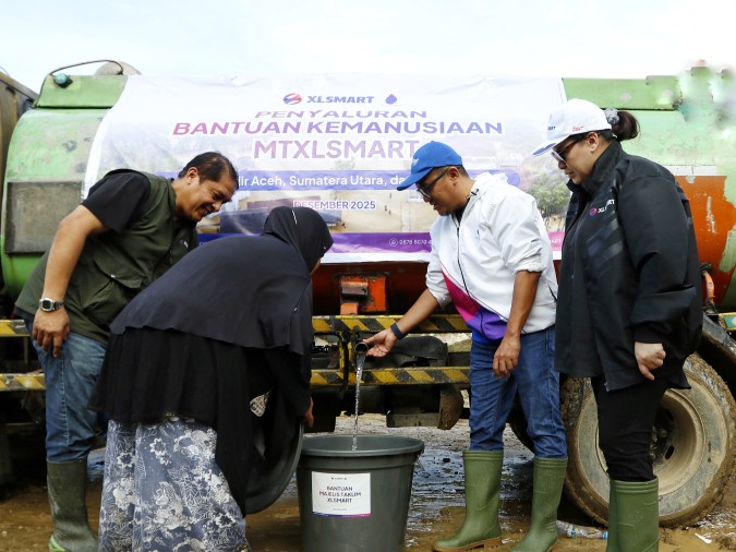 Karyawan XLSMART menyalurkan donasi ke Sumut, Sumbar hingga pelosok Aceh (foto/rilis)